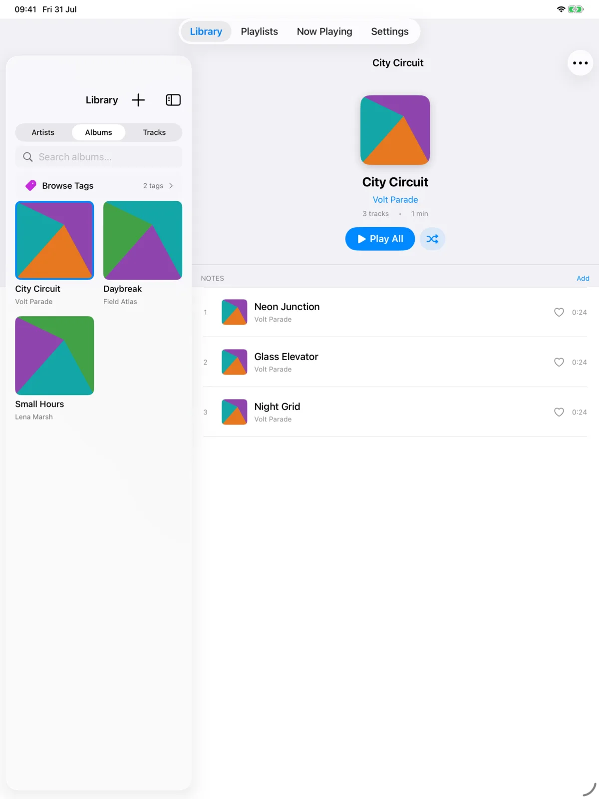 iPad showing the library list beside an open album with its track listing